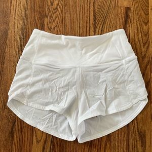 Worn once like new white Lululemon high rise Speed Up shorts in 2.5 inch.